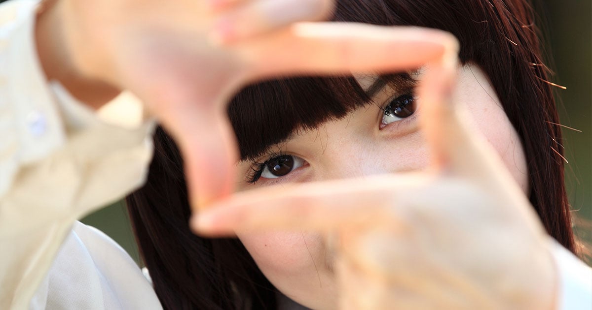 Girl Making Frame with Fingers